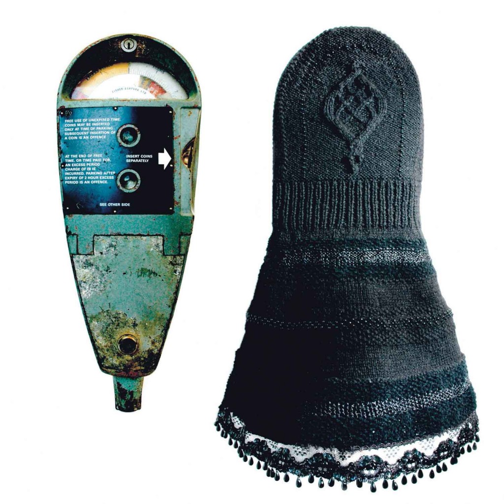 Parking Meter Mourning Hood - Shetland wool, beads and lace. Covering for a parking meter, mourning the loss of local shops deliberately forced to close by the Council's use of excessive traffic restrictions in order to gentrify neighborhoods. 